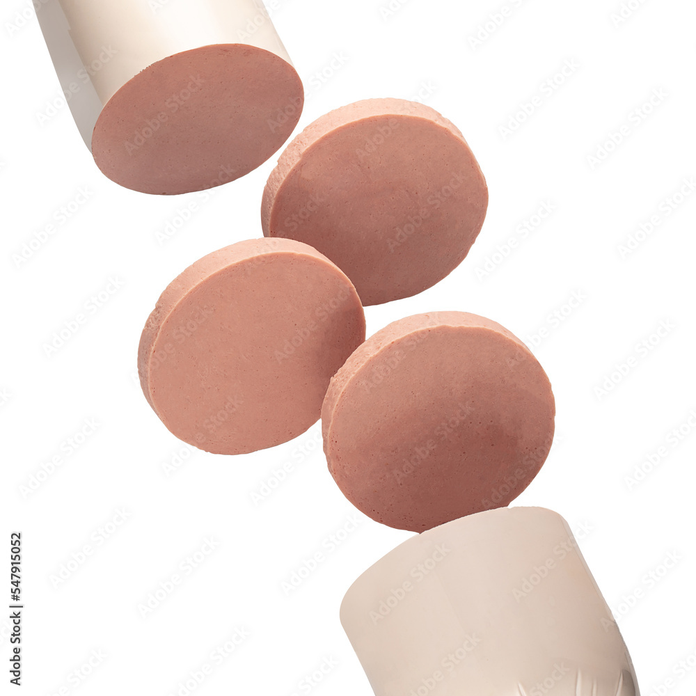 Slices of sausage salami on white background flying concept Slices of sausage salami on white background flying concept