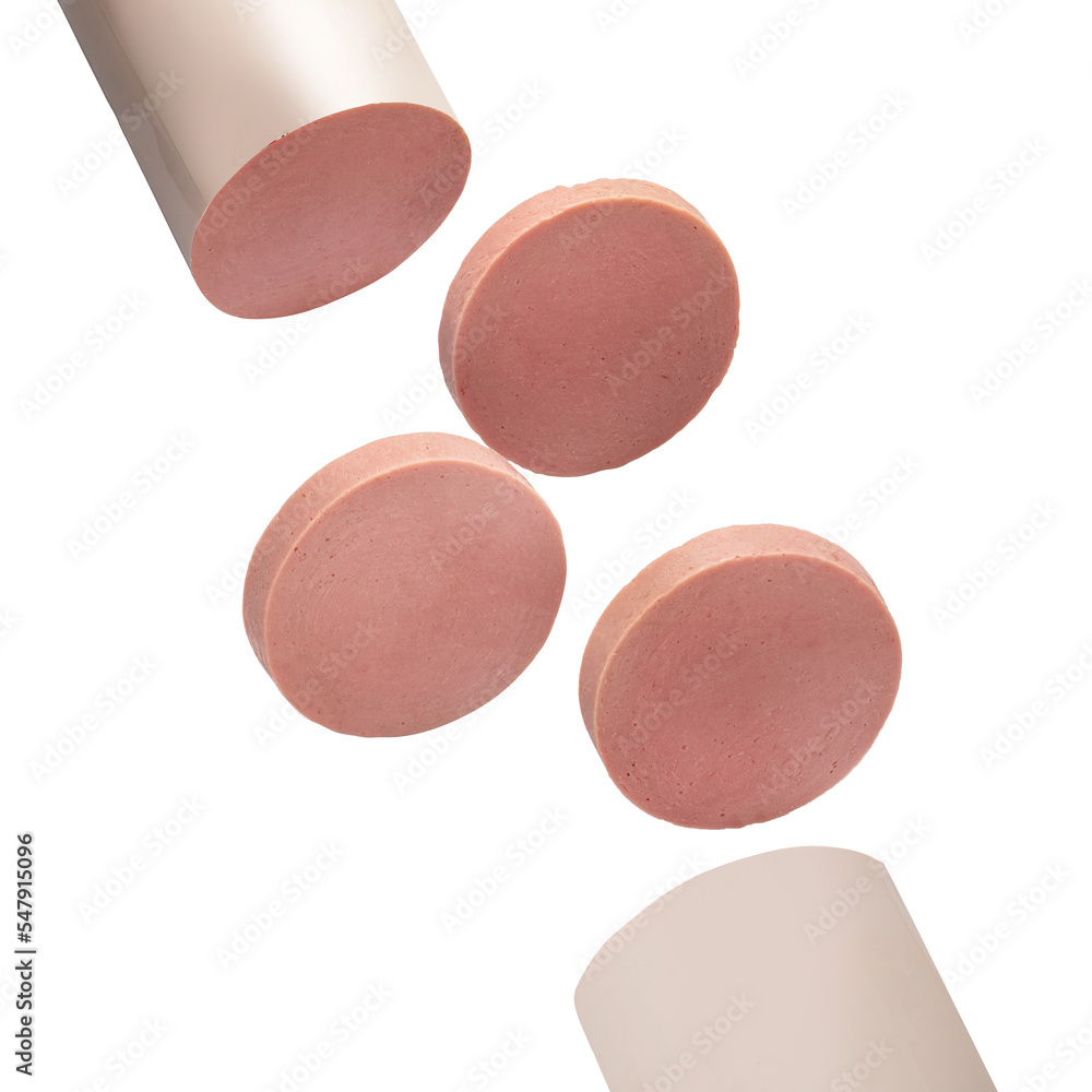 Slices of sausage salami on white background flying concept Slices of sausage salami on white background flying concept