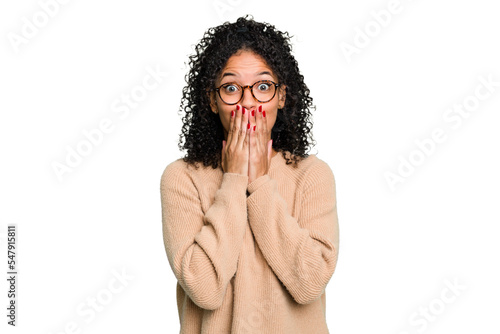 Young cute brazilian woman isolated shocked, covering mouth with hands, anxious to discover something new.