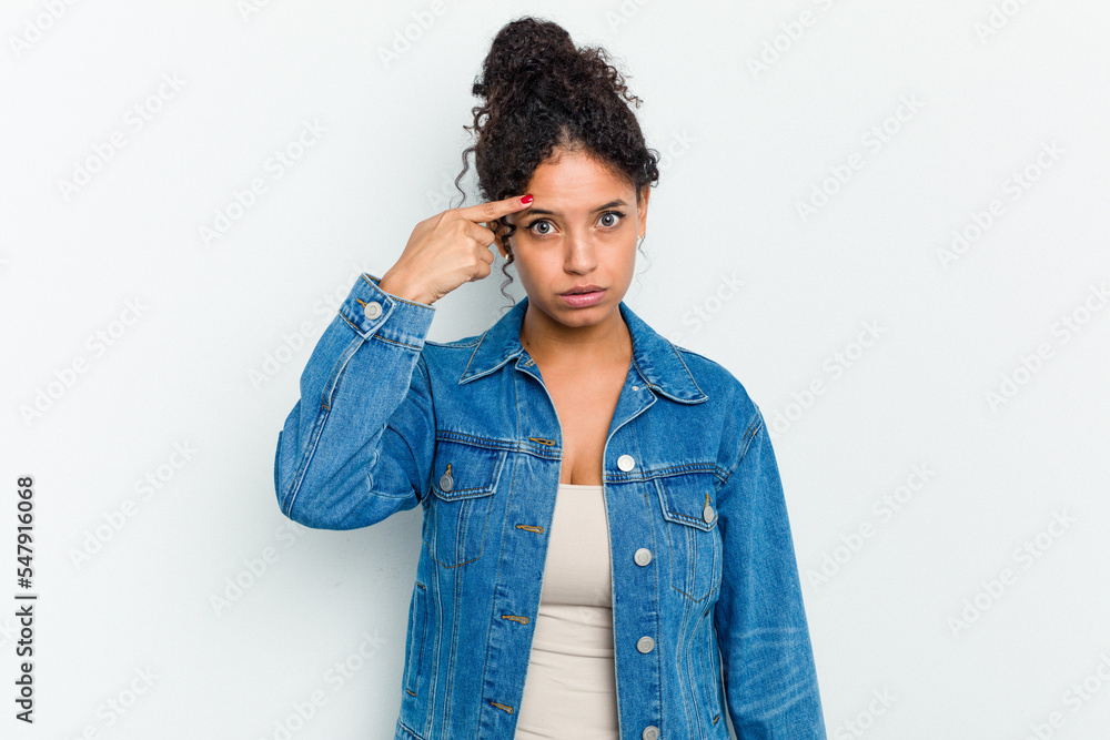 Young african american woman isolated pointing temple with finger, thinking, focused on a task. Young african american woman isolated pointing temple with finger, thinking, focused on a task.