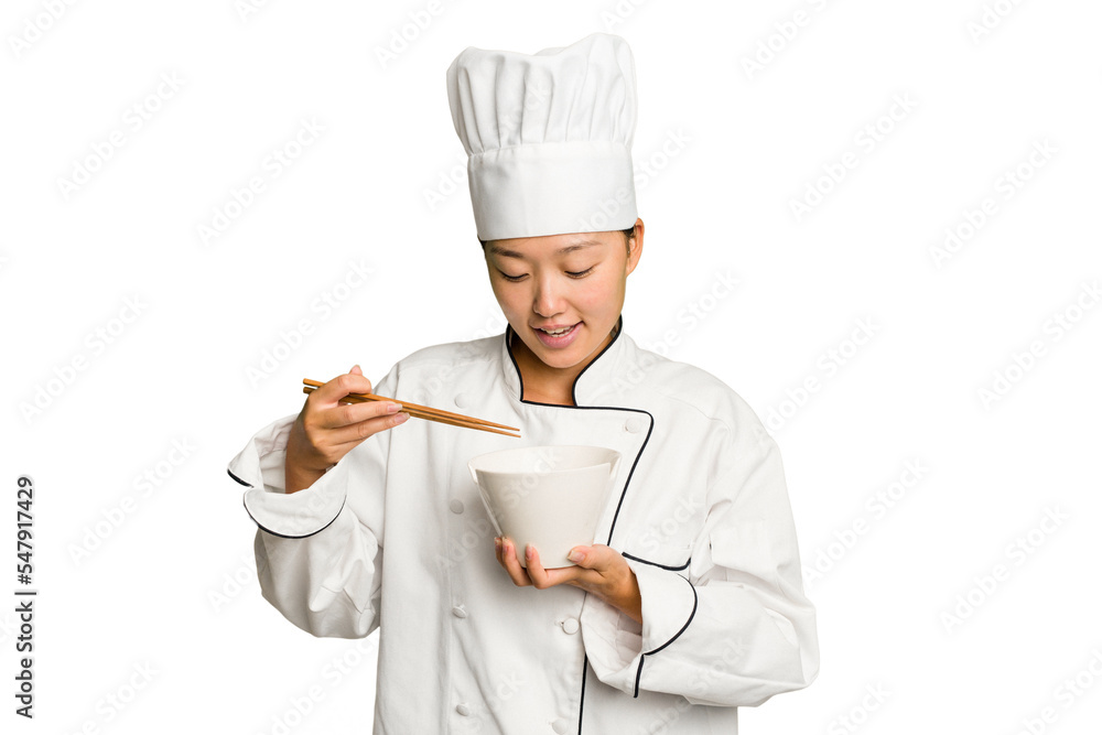 Young asian chef woman preparing noodles isolated Young asian chef woman preparing noodles isolated