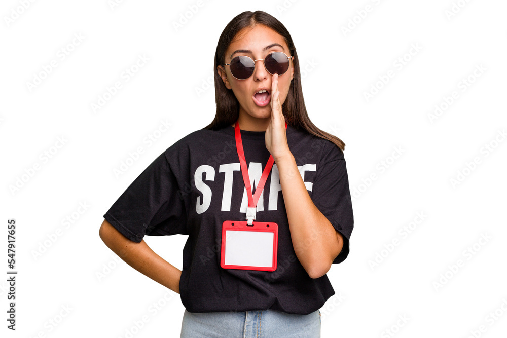 Young caucasian staff woman wearing a badge isolated is saying a secret hot braking news and looking aside Young caucasian staff woman wearing a badge isolated is saying a secret hot braking news and looking aside
