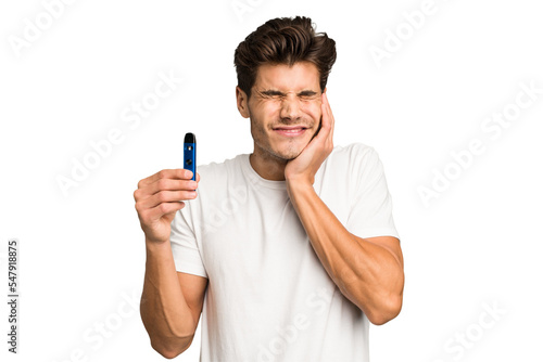 Young caucasian man holding an electronic cigarette isolated covering ears with hands.