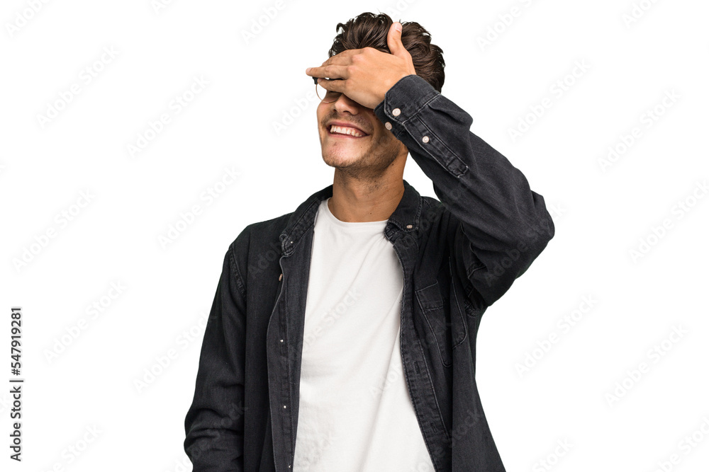Young caucasian handsome man isolated covers eyes with hands, smiles broadly waiting for a surprise. Young caucasian handsome man isolated covers eyes with hands, smiles broadly waiting for a surprise.