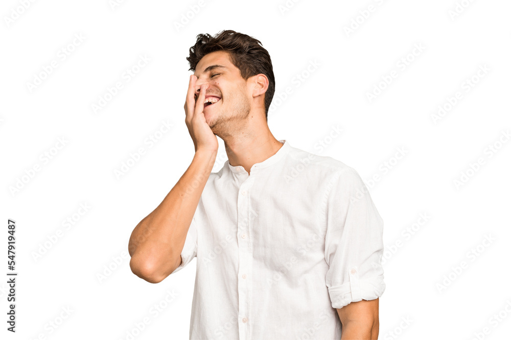 Young caucasian handsome man isolated laughing happy, carefree, natural emotion. Young caucasian handsome man isolated laughing happy, carefree, natural emotion.