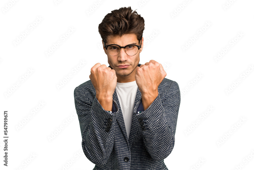 Young caucasian handsome man isolated throwing a punch, anger, fighting due to an argument, boxing. Young caucasian handsome man isolated throwing a punch, anger, fighting due to an argument, boxing.