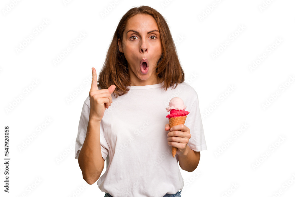 Young caucasian woman holding an ice cream isolated having an idea, inspiration concept. Young caucasian woman holding an ice cream isolated having an idea, inspiration concept.