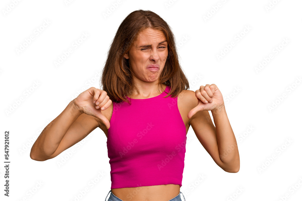 Young caucasian woman isolated showing thumb down, disappointment concept. Young caucasian woman isolated showing thumb down, disappointment concept.