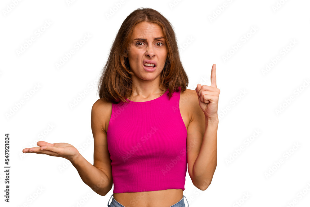 Young caucasian woman isolated holding and showing a product on hand. Young caucasian woman isolated holding and showing a product on hand.