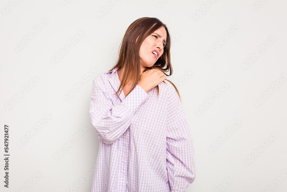 Young caucasian cute woman isolated on white background having a shoulder pain. Young caucasian cute woman isolated on white background having a shoulder pain.
