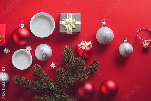 christmas gifts on a red background with packages and decorative pieces of christmas motifs