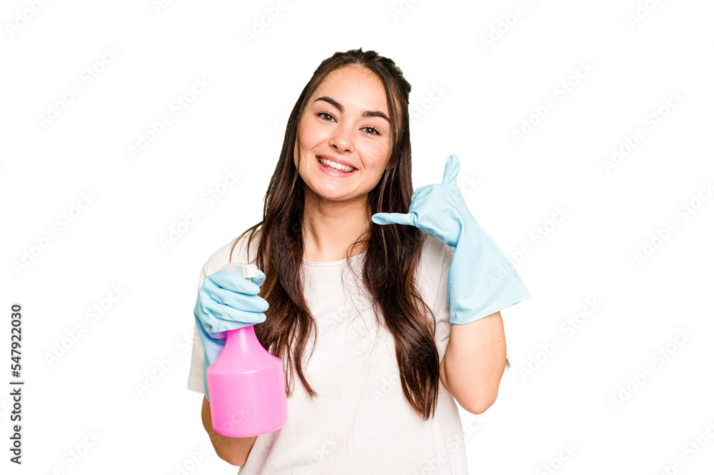 Young cleaner caucasian woman isolated on green chroma background showing a mobile phone call gesture with fingers. Young cleaner caucasian woman isolated on green chroma background showing a mobile phone call gesture with fingers.