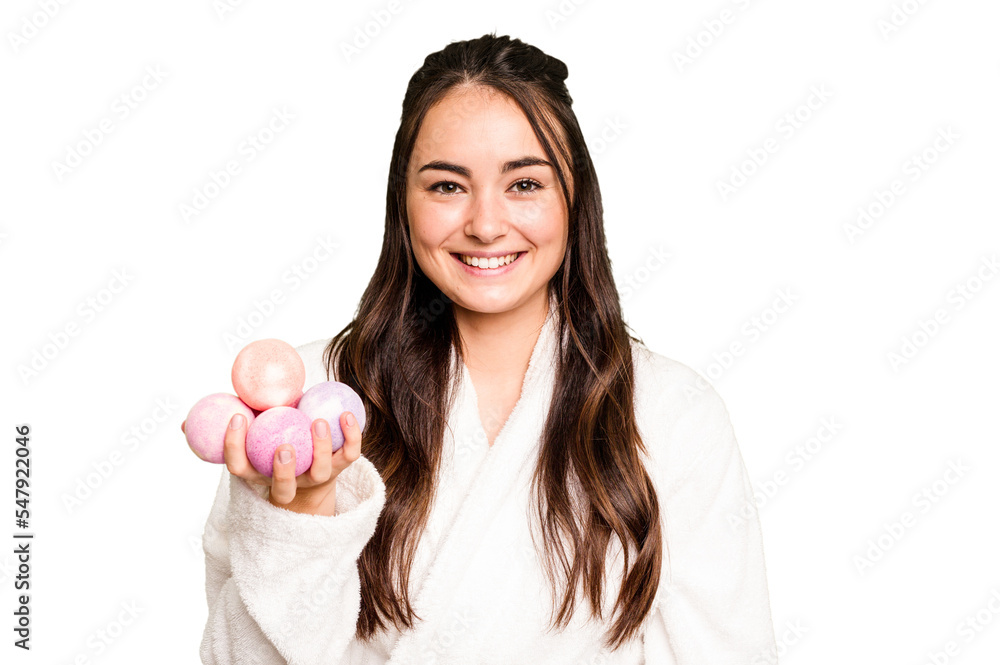Young caucasian woman holding aromatic balls for bathtub isolated on green chroma background happy, smiling and cheerful. Young caucasian woman holding aromatic balls for bathtub isolated on green chroma background happy, smiling and cheerful.