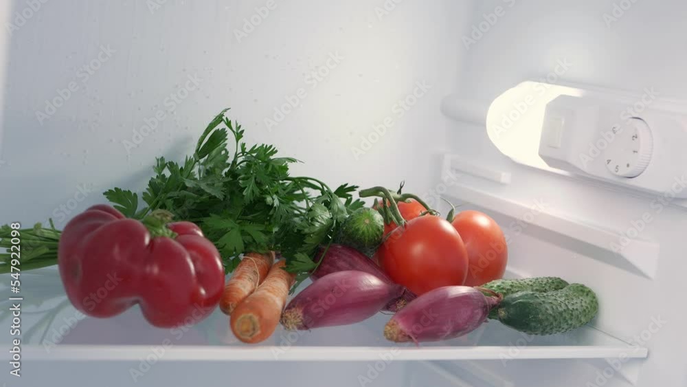 Man Hand Opens Kitchen Fridge Door Looking Inside for Fresh Food and Drink. Empty Fridge, Food Crisis Concept. Man Hand Opens Kitchen Fridge Door Looking Inside for Fresh Food and Drink. Empty Fridge, Food Crisis Concept.