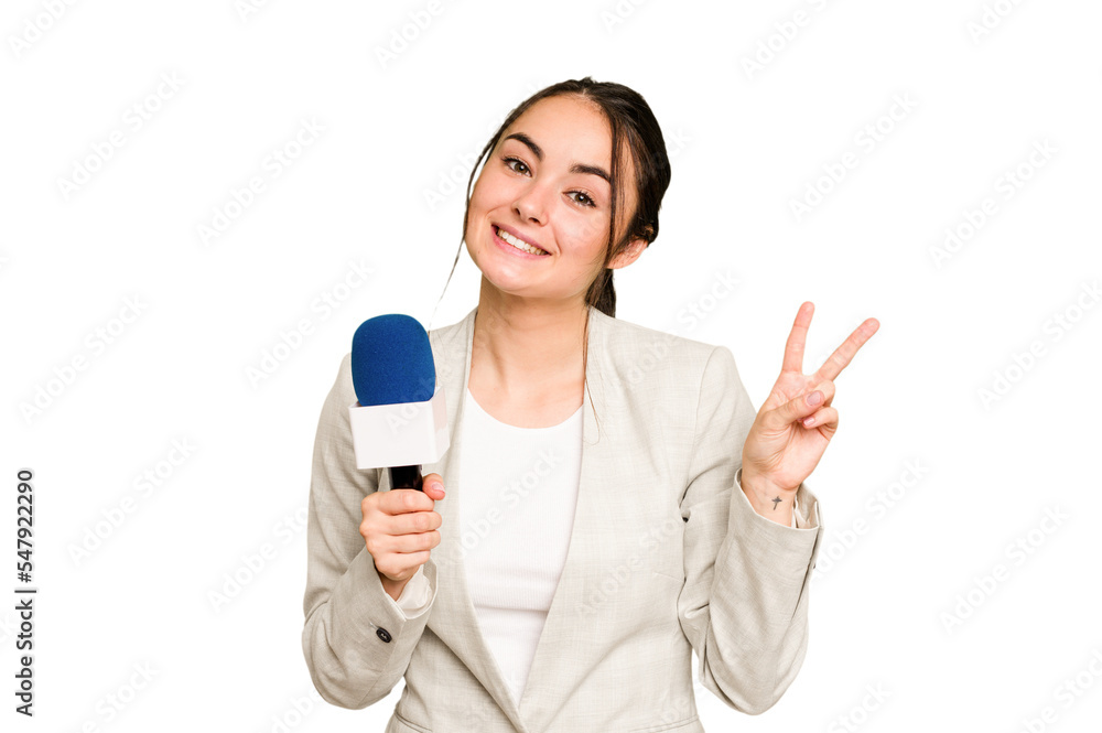 Young TV presenter caucasian woman isolated on green chroma background joyful and carefree showing a peace symbol with fingers. Young TV presenter caucasian woman isolated on green chroma background joyful and carefree showing a peace symbol with fingers.