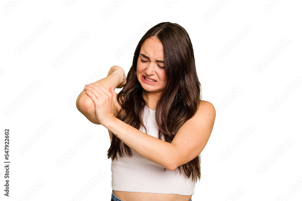 Fototapeta premium Young caucasian woman isolated on green chroma background massaging elbow, suffering after a bad movement.