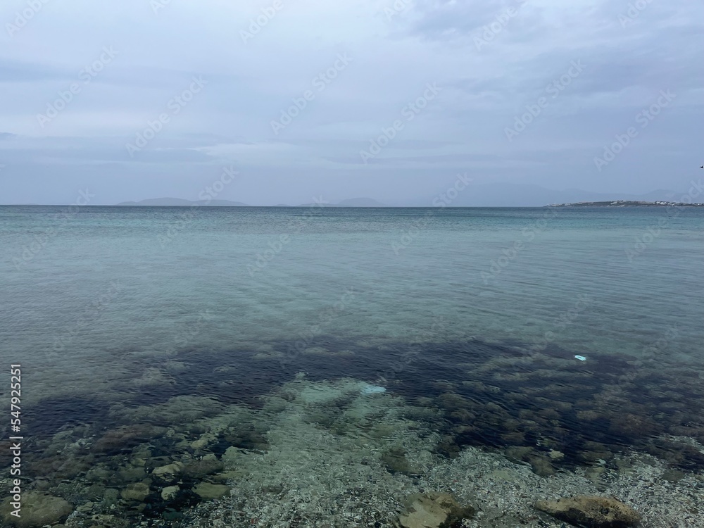 Rainy dark seascape, transparent sea water Rainy dark seascape, transparent sea water