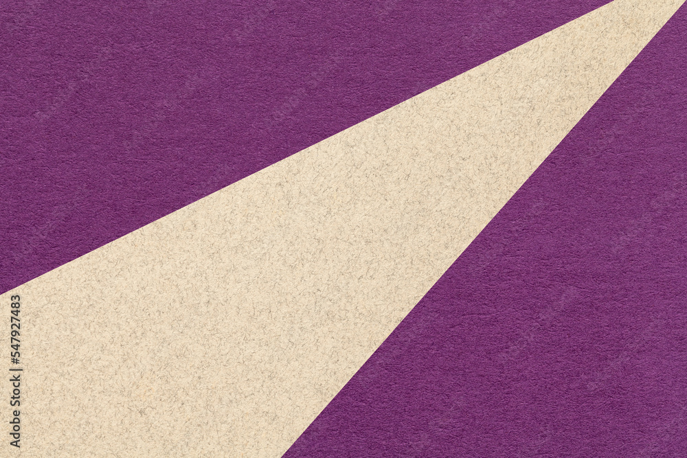 Texture of old craft dark purple color paper background with beige line, macro. Vintage abstract violet cardboard Texture of old craft dark purple color paper background with beige line, macro. Vintage abstract violet cardboard