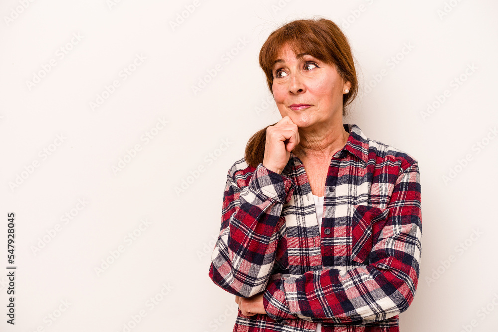 Middle age caucasian woman isolated on white background looking sideways with doubtful and skeptical expression. Middle age caucasian woman isolated on white background looking sideways with doubtful and skeptical expression.