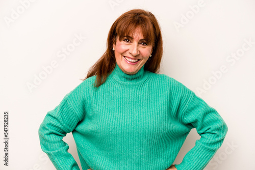 Middle age caucasian woman isolated on white background confident keeping hands on hips.