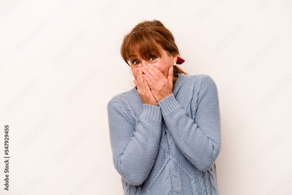 Middle age caucasian woman isolated on white background laughing about something, covering mouth with hands. Middle age caucasian woman isolated on white background laughing about something, covering mouth with hands.