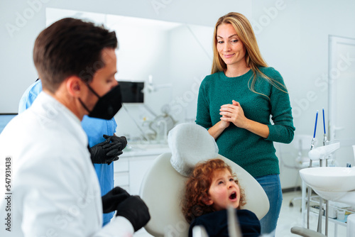 Family at dentist office.