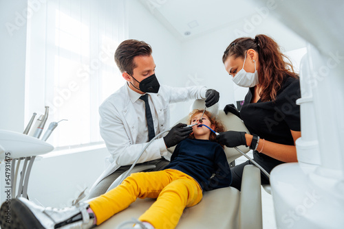 Child at dentist office having treatment.
