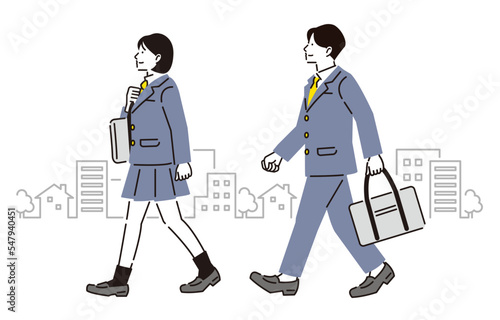 通学する高校生の男女