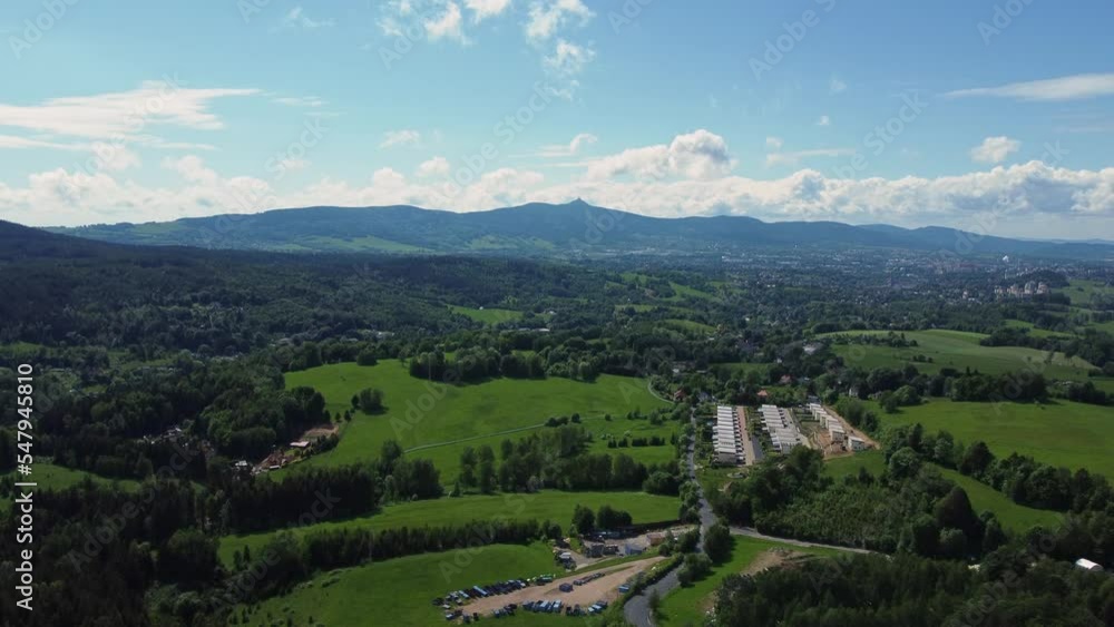 Drone aerial view of Liberec city from Jablonec nad Nisou, famous Jested signal transmitter in background, Czech Republic Drone aerial view of Liberec city from Jablonec nad Nisou, famous Jested signal transmitter in background, Czech Republic