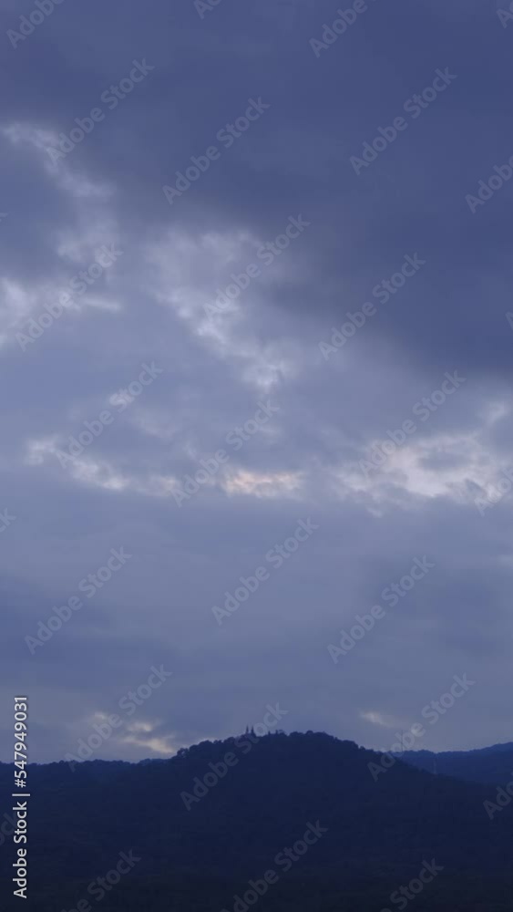 Twilight and dawn sky with cumulus cloud vertical time lapse in an evening. Twilight and dawn sky with cumulus cloud vertical time lapse in an evening.