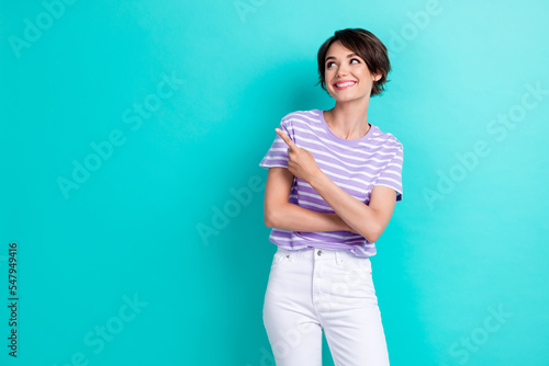 Photo of lovely cheerful pretty lady girlfriend arm direct index empty space cool boutique low price isolated on cyan color background