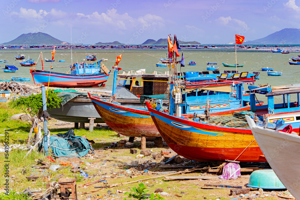 Fishing boats on the shore. Vietnam, Doclet, near Nha Trang. Fishing village. Fishing boats on the shore. Vietnam, Doclet, near Nha Trang. Fishing village.