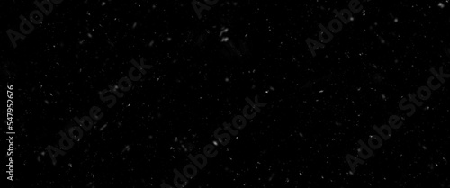 Different realistic falling snow or snowflakes. Falling snow isolated on black background. Winter snowfall illustration. Bokeh lights on black background  flying snowflakes in the air. Snow at night.