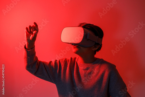 Girl in glasses of virtual reality, augmented reality, future technology