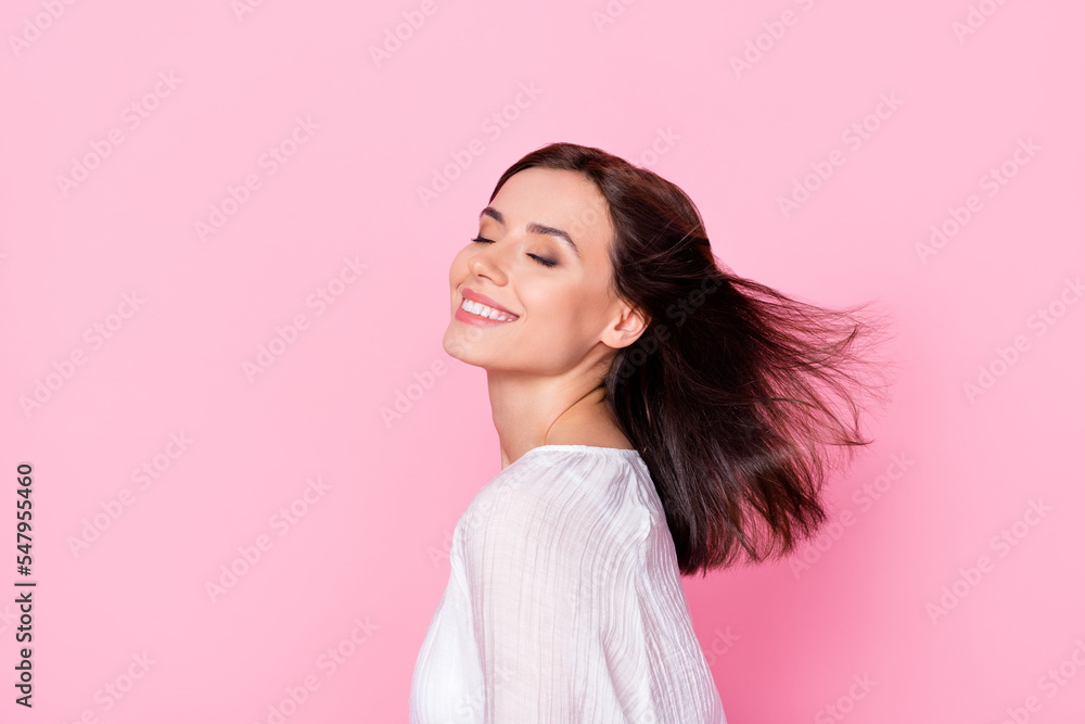 Photo portrait of gorgeous young lady closed eyes enjoy fresh spring wind wear trendy white clothes isolated on pink color background Photo portrait of gorgeous young lady closed eyes enjoy fresh spring wind wear trendy white clothes isolated on pink color background