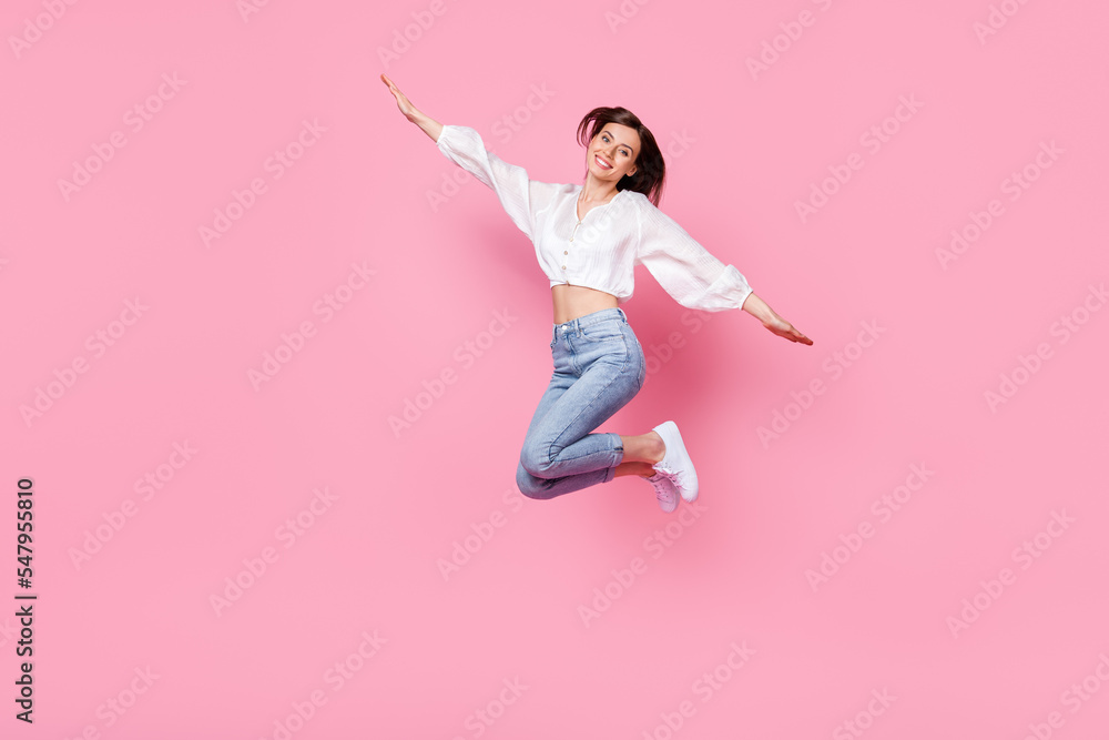 Full length photo of satisfied lady imagine dream can fly hurry up black friday discount empty space isolated on pink color background