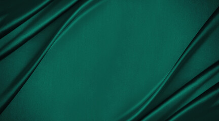 Dark teal green silk satin. Shiny smooth fabric. Soft folds. Luxury background with space for design. web banner. Flat lay, top view table. Birthday, Christmas, Valentine, New year.