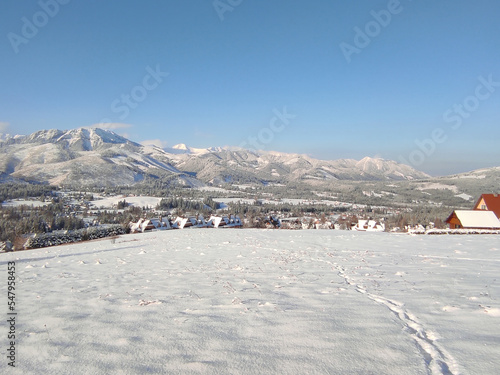 landscape with tatra mountains. winter scenery against the blue sky. koscielisko. poland