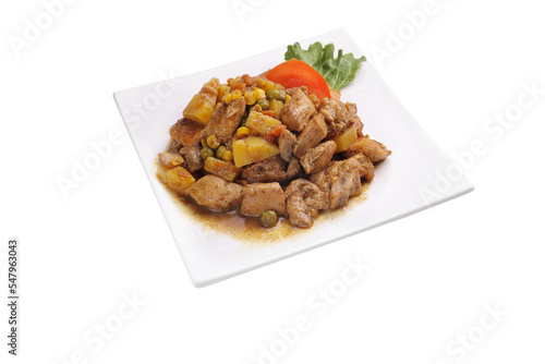 Chicken curry with vegetables on a white plate