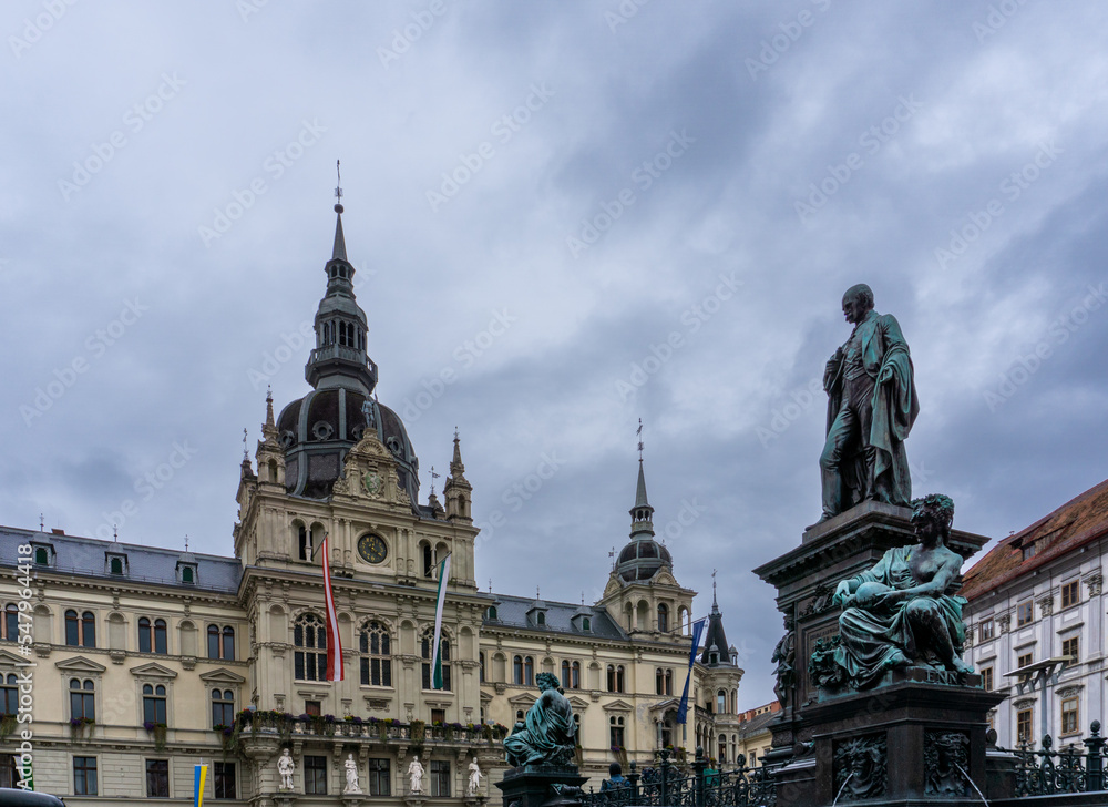the Archduke Johann fountain and city hall of Graz on the main square in downtown the Archduke Johann fountain and city hall of Graz on the main square in downtown