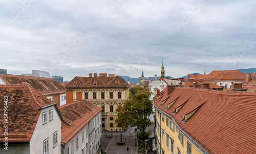 view of the rooftops of the old centre of Graz with the Schlossberg Square below