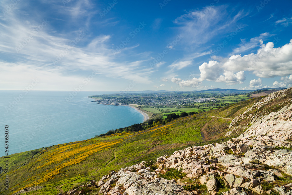 Landscape of Greystones and its surroundings with dramatic cloudy sky from the cliffs.