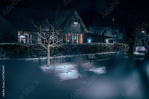 Snow and winter night in a small Swedish town, side walk © Niclas