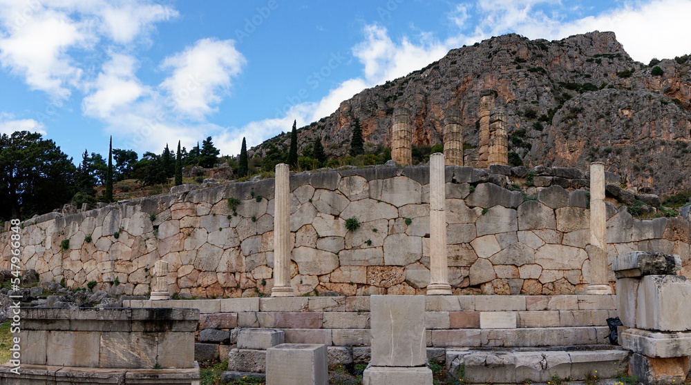 view of Doric columns and temple ruins in the Sanctuary Athena Pronaia in Delphi