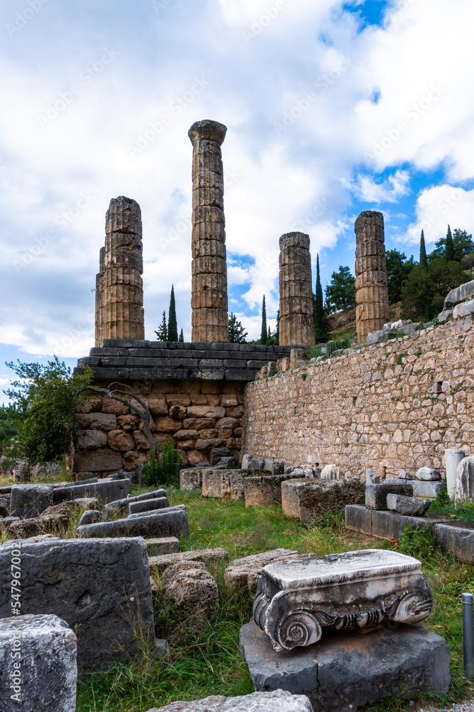 view of Doric columns and temple ruins in the Sanctuary Athena Pronaia in Delphi