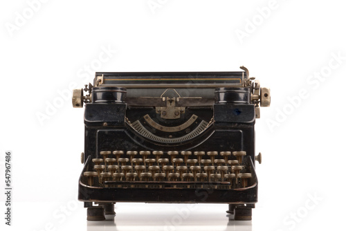 old vintage typewriter isolated on white background with real shadows