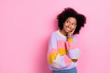 Photo of good mood intelligent girl perming coiffure wear knit sweater look empty space hand on cheek isolated on pink color background