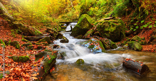 Tablou pe pânză Autumn landscape - view of a mountain river with a cascade of waterfallsin the a