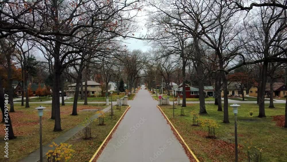 The entrance of McGraft park in Autumn with lovely colors on the leaves. The entrance of McGraft park in Autumn with lovely colors on the leaves.