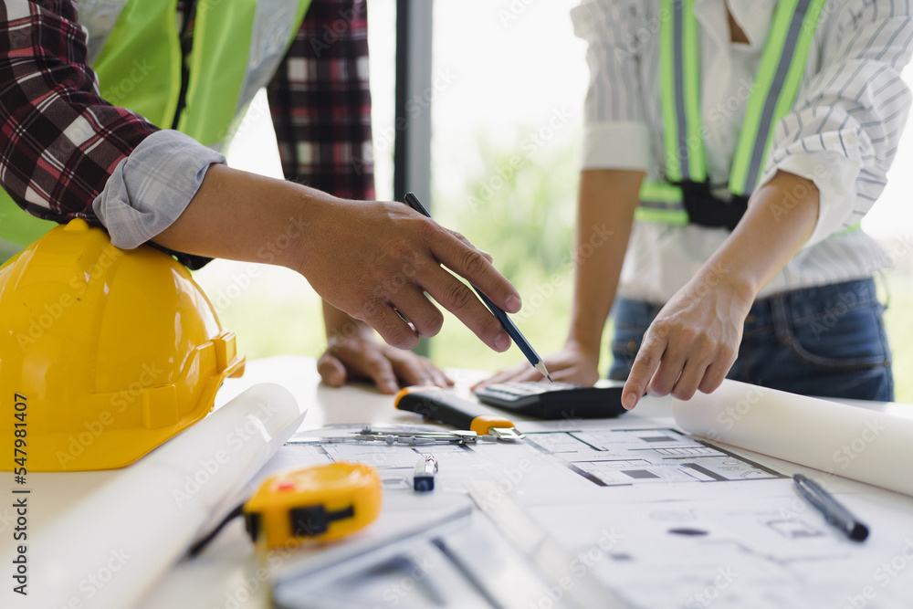 Architect Engineer Design Working on Blueprint Planning Concept. Construction Concept, Construction engineering design inspector team. Architect Engineer Design Working on Blueprint Planning Concept. Construction Concept, Construction engineering design inspector team.
